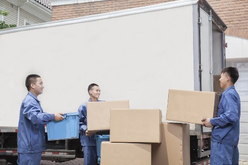Removalists loading household furniture for a Kingston home move