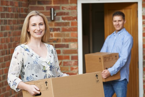 Boxes and household items arranged for a Kingston moving day