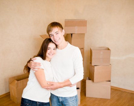 Packed boxes and furniture prepared for a Kingston house move