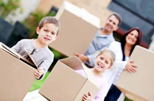 Mover wearing PPE while handling furniture safely