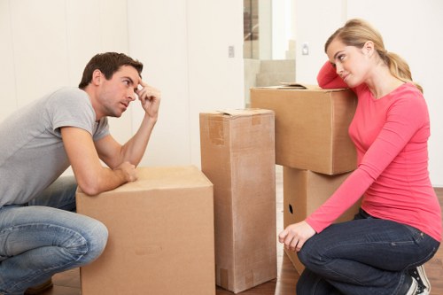 Local moving team managing apartment access and parking in Kingston