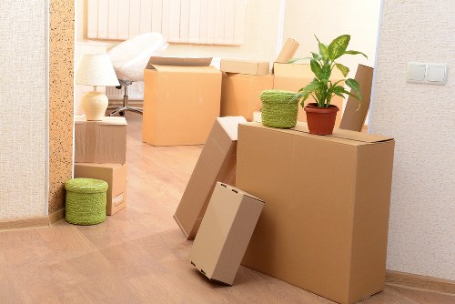 Packing boxes and household items ready for a Kingston moving day