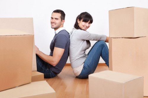 Packing and loading household items into a removal van in Kingston